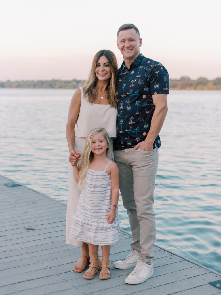 family at white rock lake dock