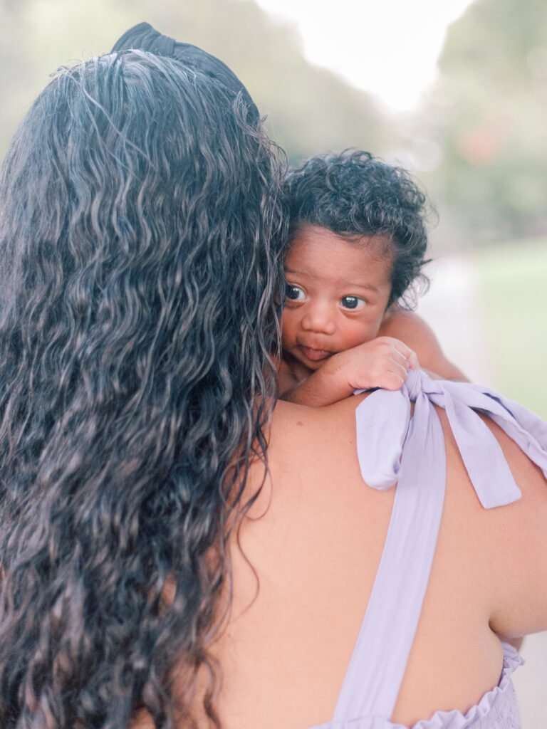 baby over mom's shoulder