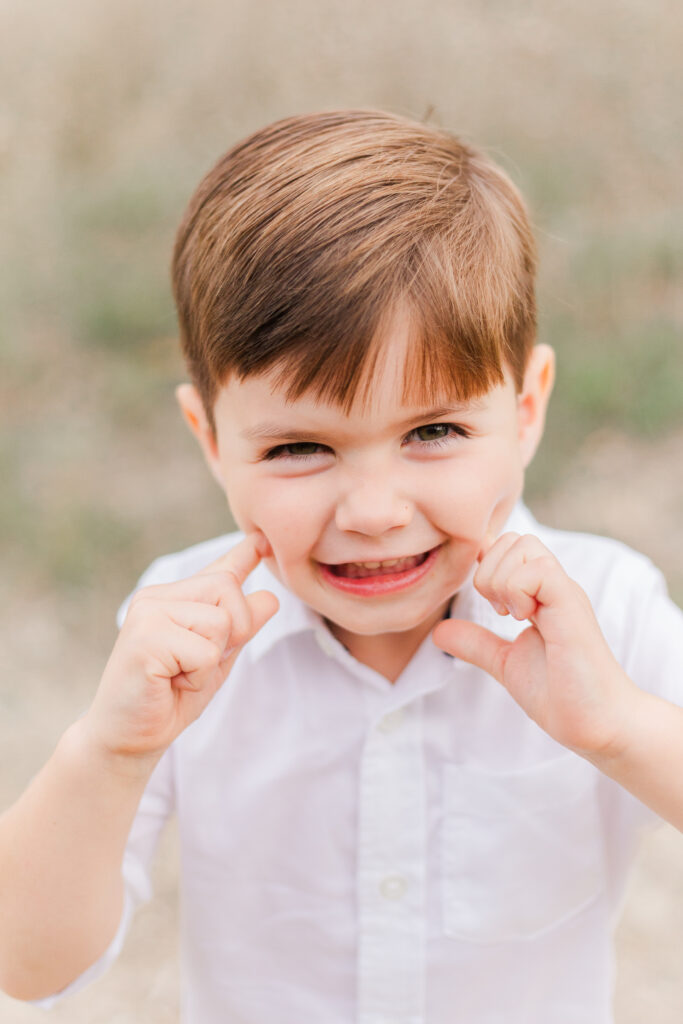 boy smiles at Norbuck Park, Kate White Photography