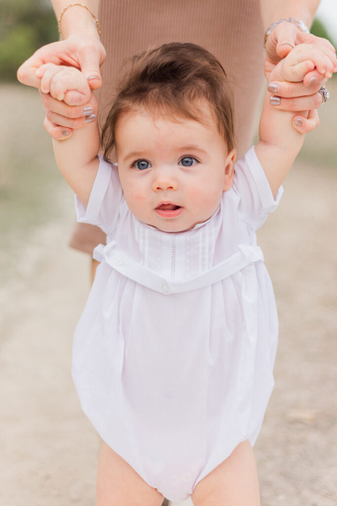 baby standing at Norbuck Park, Kate White Photography