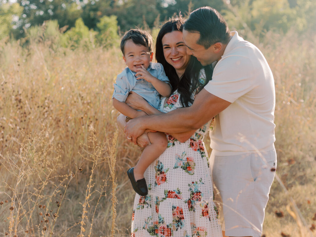 Family in field at White Rock Lake Dallas TX by Kate White Photography