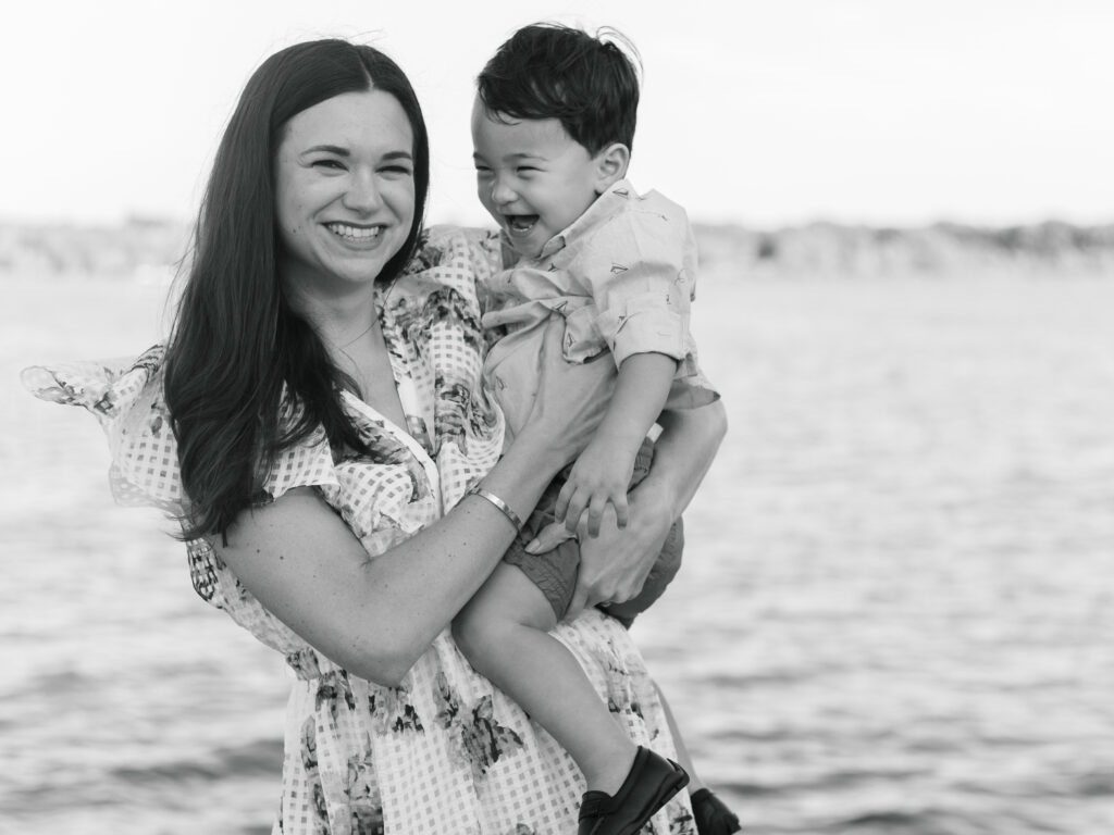 mom and baby on the dock at White Rock Lake Dallas TX by Kate White Photography