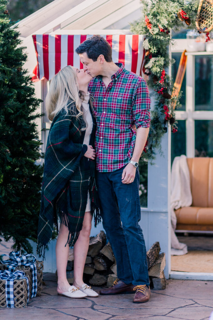 couple kisses at the greenhouse at Lemon Drop Studios in McKinney with Kate White Photography