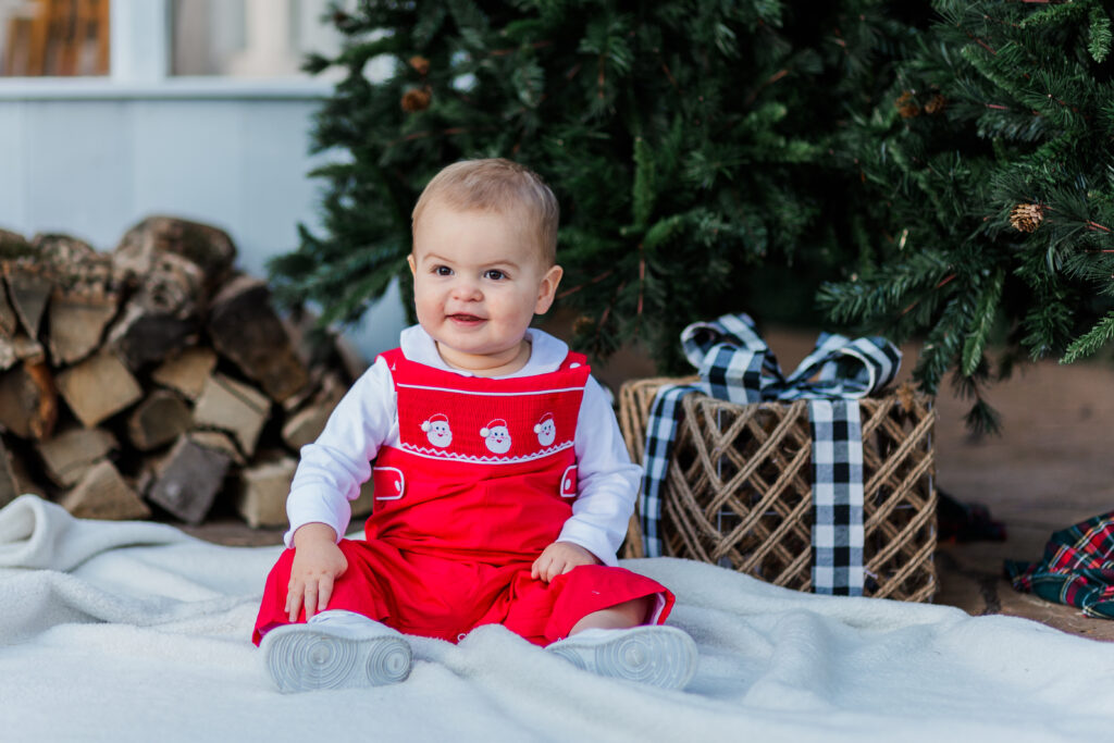 baby sitting at the greenhouse at Lemon Drop Studios in McKinney with Kate White Photography