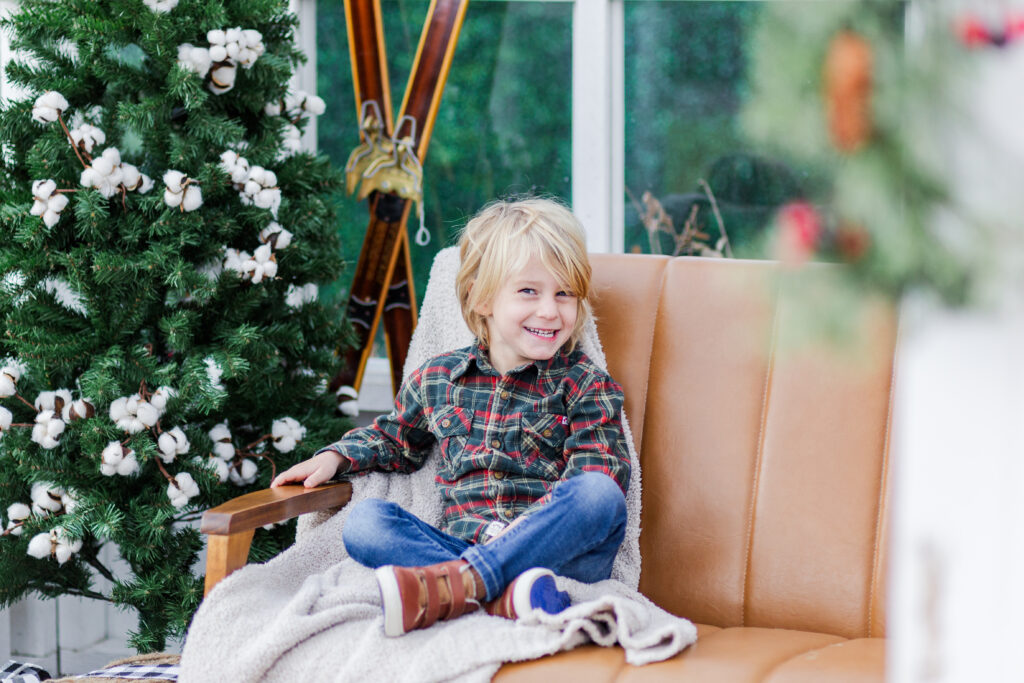 little boy smiling at Lemon Drop Studios McKinney TX by Kate White Photography