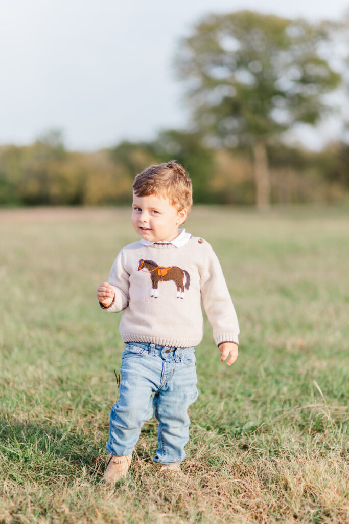 little boy at Mill Creek Reservoir Park in Canton TX with Kate White Photography