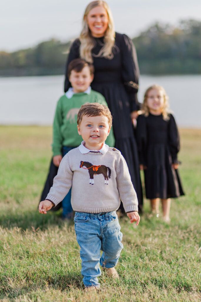 boy running at Mill Creek Reservoir Park in Canton TX with Kate White Photography