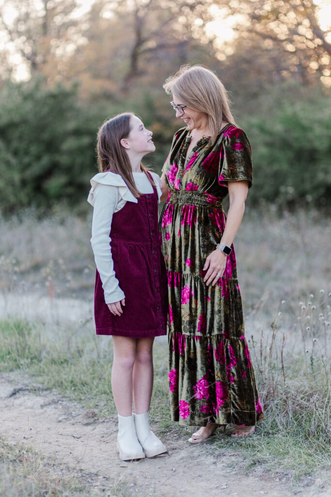 mother and daughter smile at Norbuck Park by Kate White photography