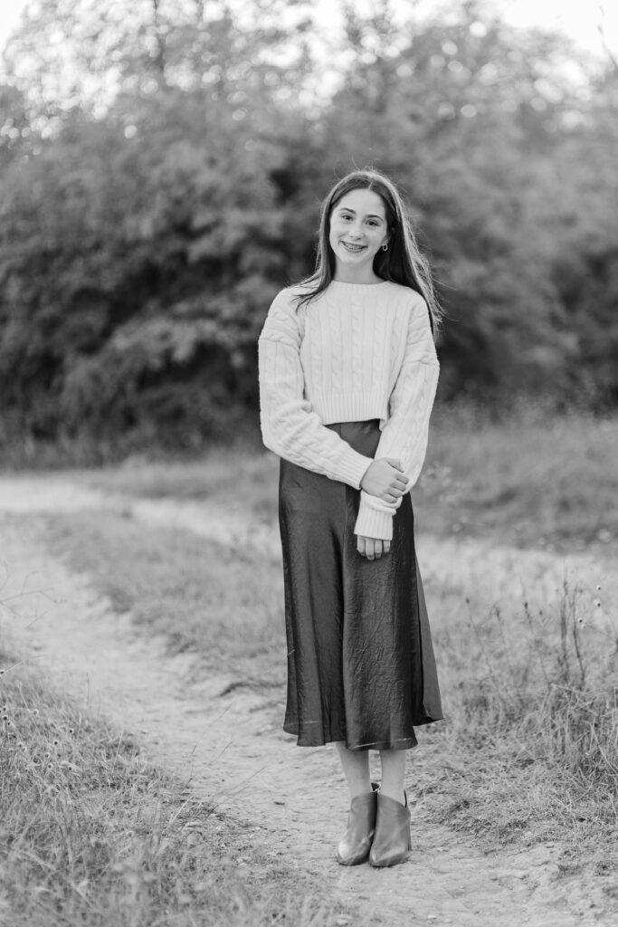 daughter smiles at Norbuck Park by Kate White photography