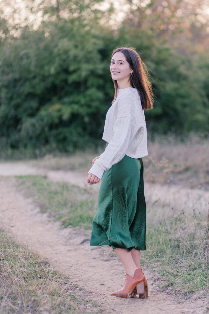 daughter smiles at Norbuck Park by Kate White photography