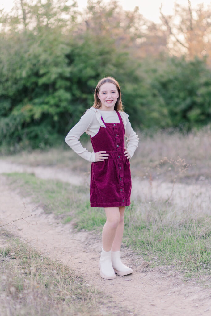 daughter smiles at Norbuck Park by Kate White photography