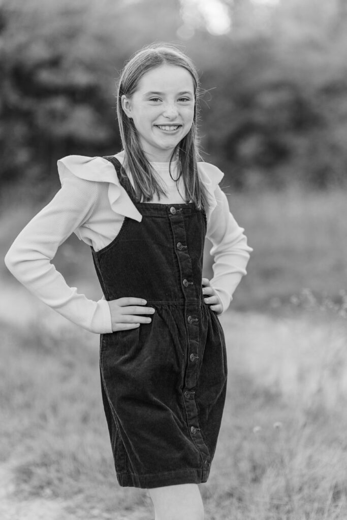 daughter smiles at Norbuck Park by Kate White photography