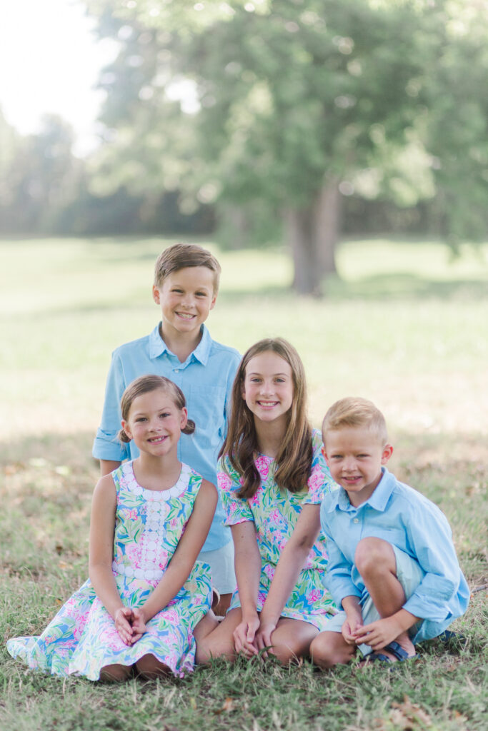siblings at Harry S Moss Park in Dallas TX