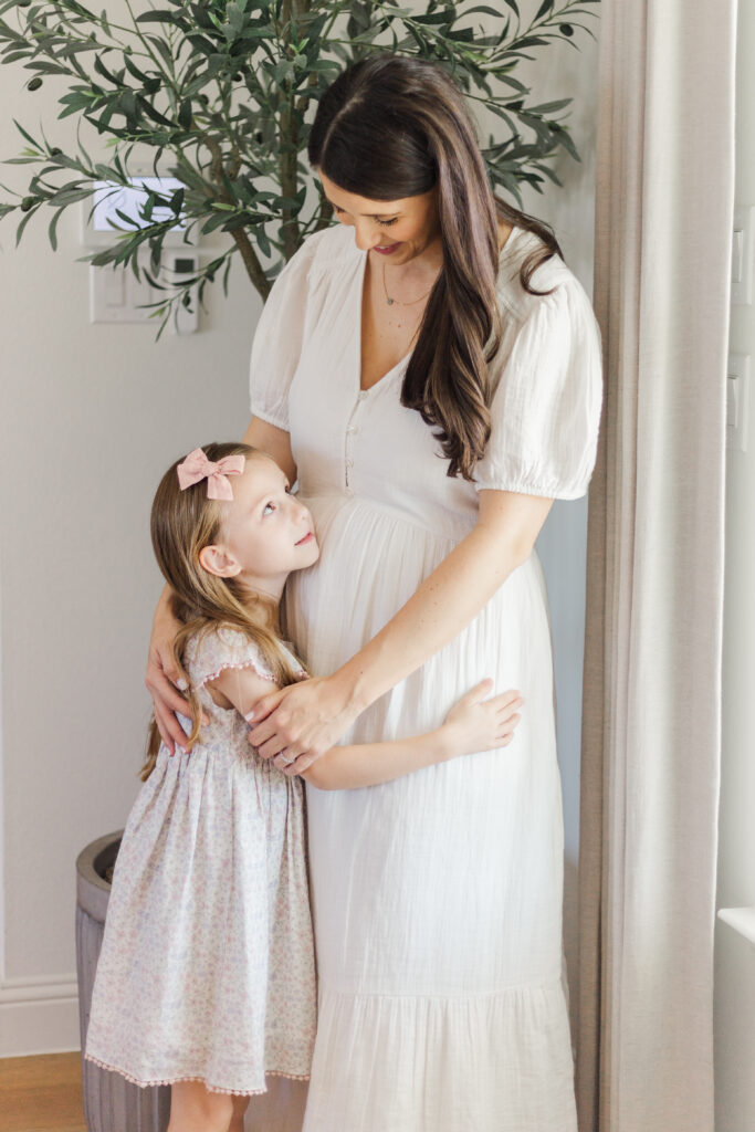 mom and daughter hug