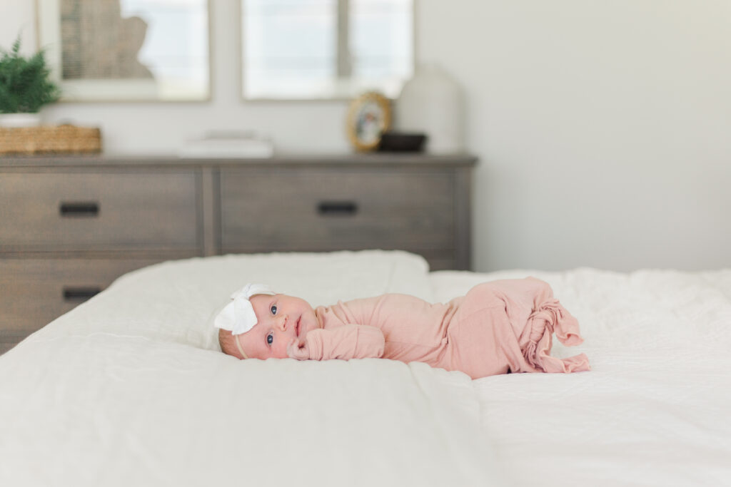 baby girl on bed