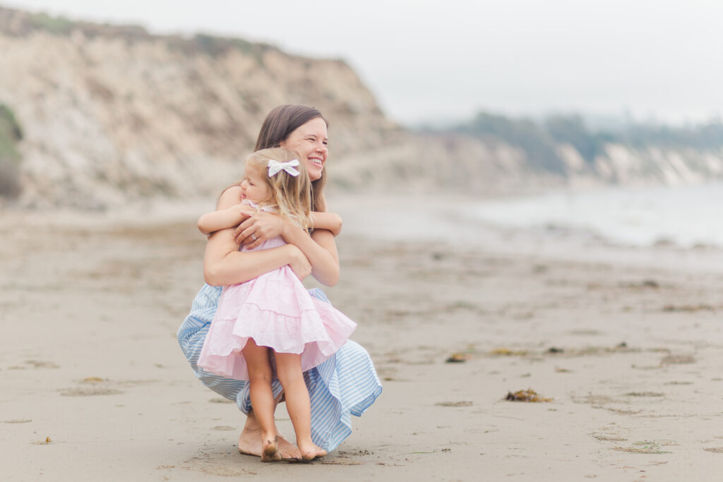 girl hugging her mom