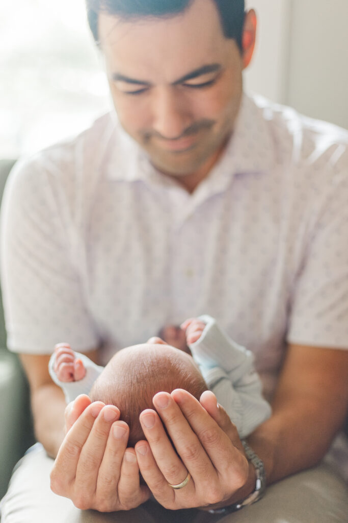 dad looking at baby boy