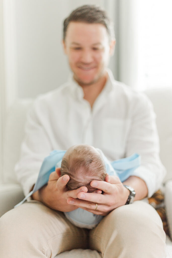 dad and newborn in Dallas TX
