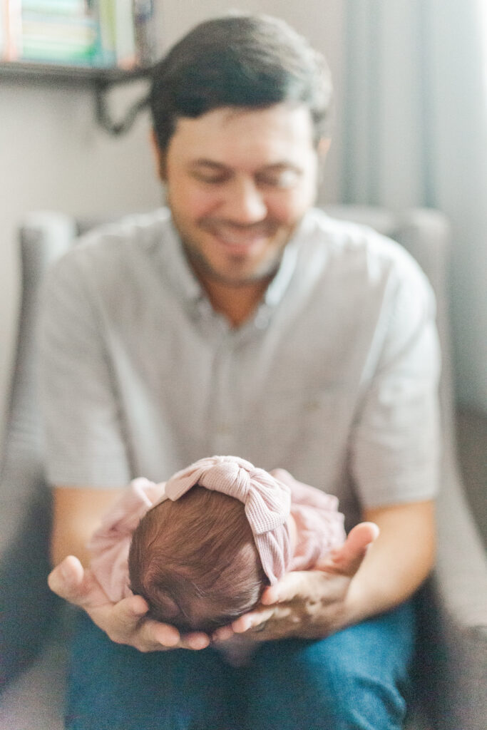 Dad with newborn in Dallas TX