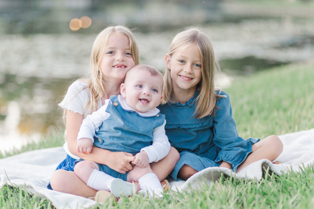 siblings smile together