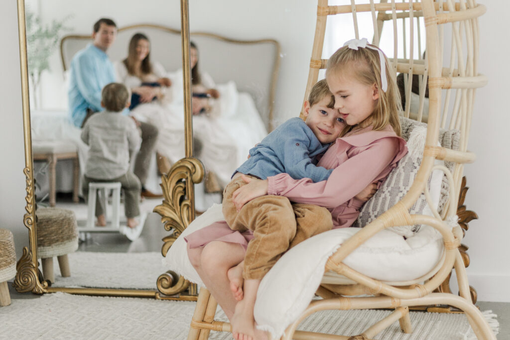 brother snd sister hugging at Lemon Drop Studios in McKinney TX