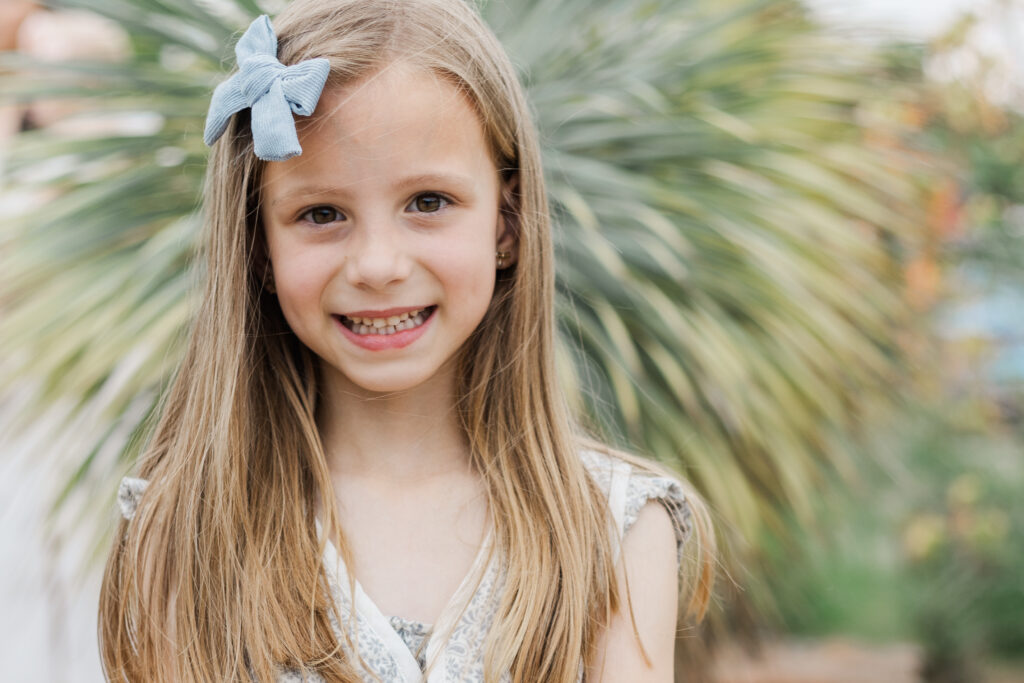 little girl at Grapevine botanical garden