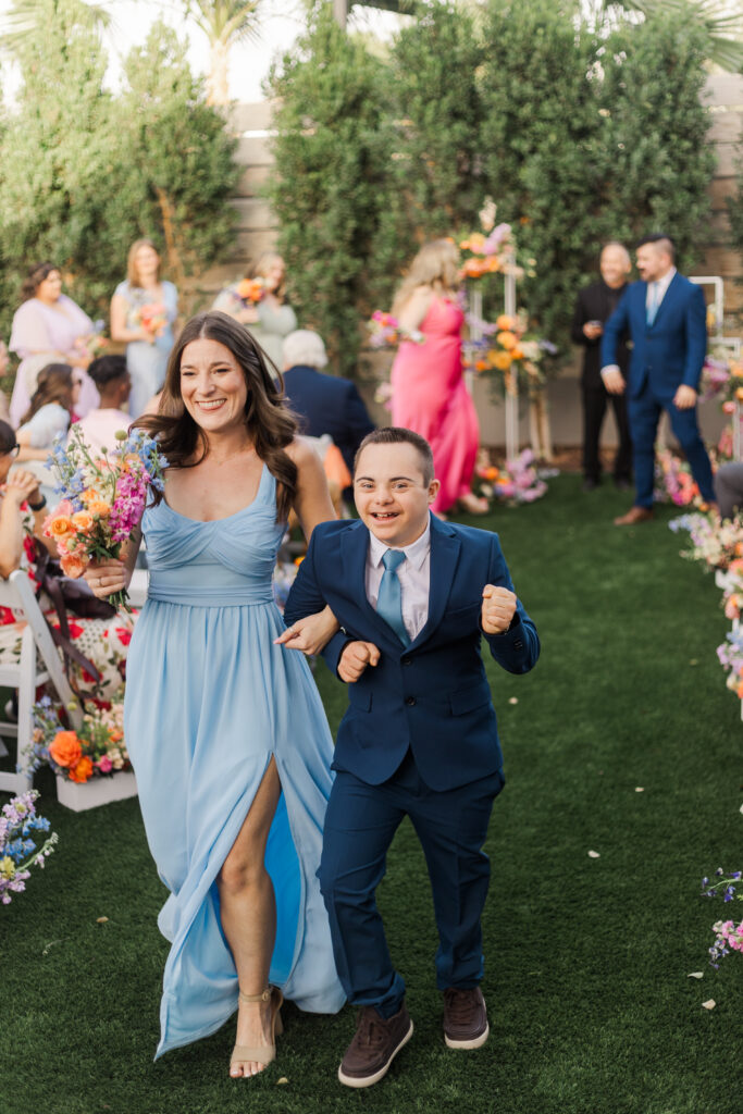 wedding part joyfully walking back down the aisle! 