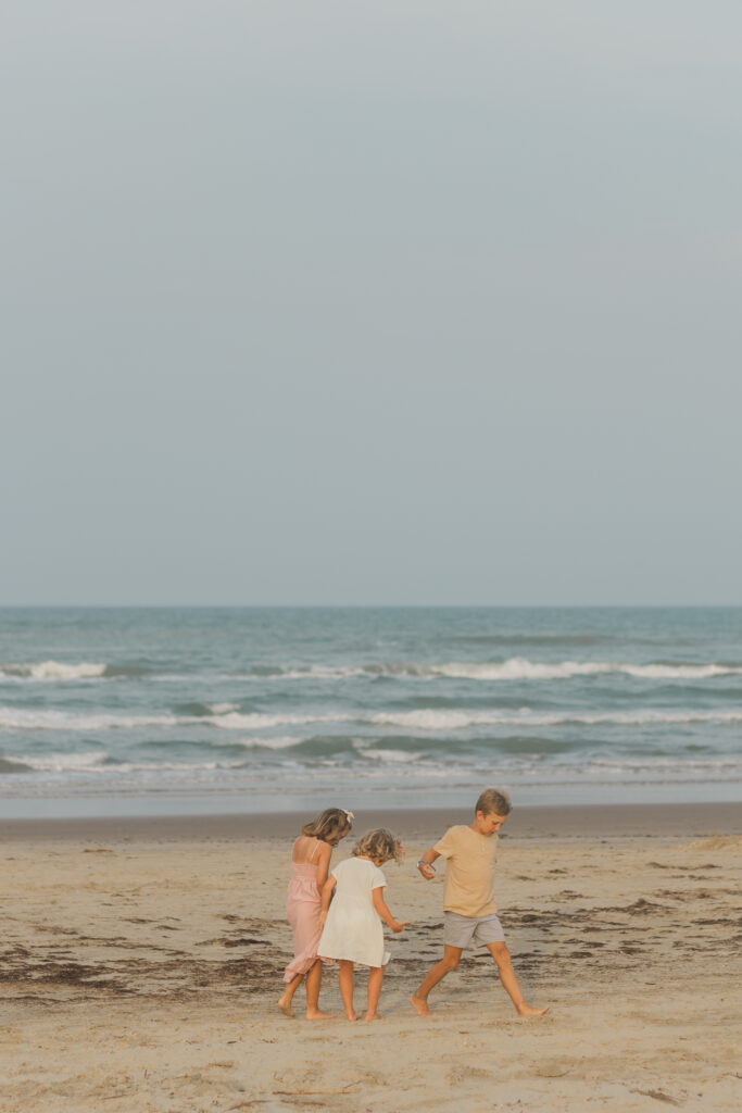 kids playing at the beach