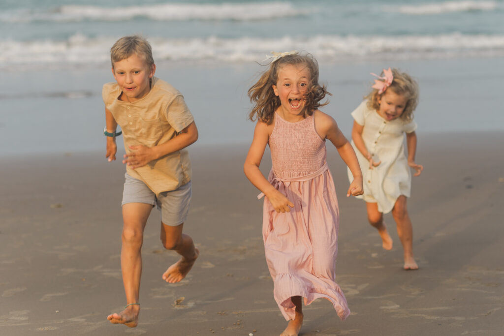 kids playing at the beach